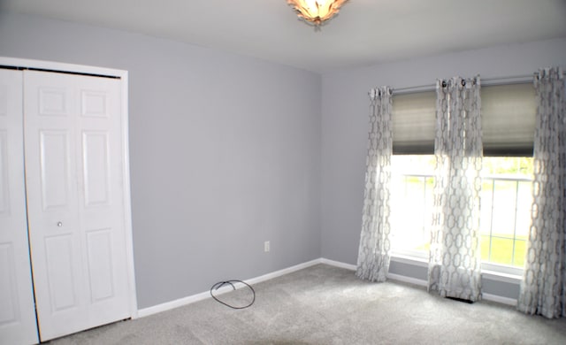 4439 Hunters Cir W, Canton, MI 48188 - empty room with carpet flooring and baseboards