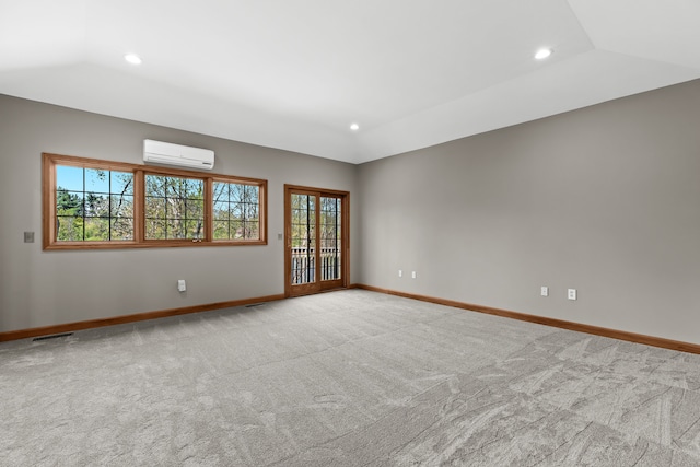 9997 Applegate Ln, Brighton, MI 48114 - carpeted empty room featuring a wall mounted air conditioner, baseboards, recessed lighting, and lofted ceiling