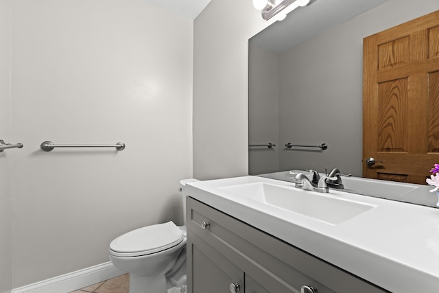 9997 Applegate Ln, Brighton, MI 48114 - bathroom featuring toilet, tile patterned floors, vanity, and baseboards