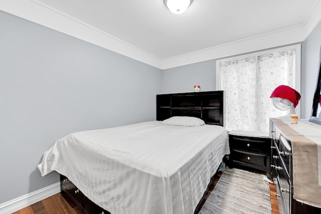 38342 Sleigh Dr, Sterling Heights, MI 48310 - bedroom with wood finished floors, crown molding, and baseboards