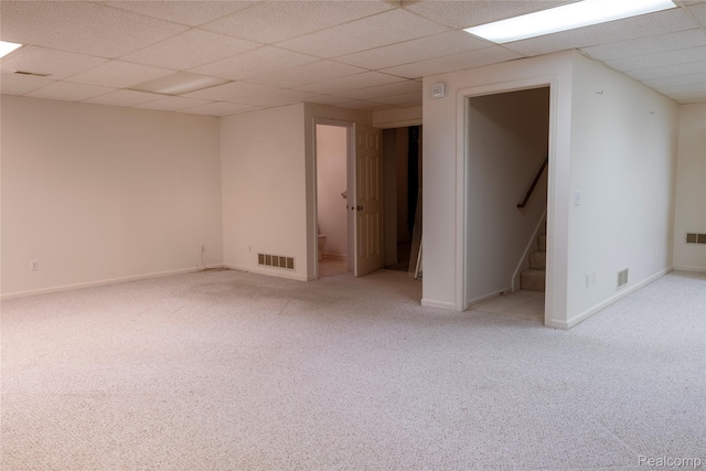 4359 Springbrook Dr, Swartz Creek, MI 48473 - finished basement with carpet flooring, a paneled ceiling, stairway, and baseboards