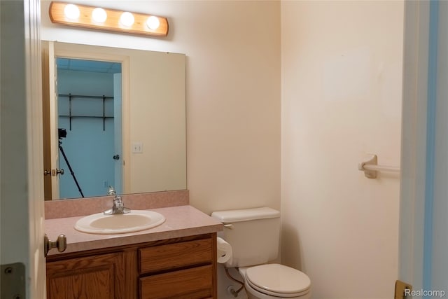 4359 Springbrook Dr, Swartz Creek, MI 48473 - half bathroom with vanity and toilet