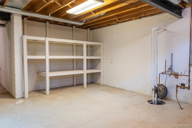 4359 Springbrook Dr, Swartz Creek, MI 48473 - unfinished below grade area with brick wall