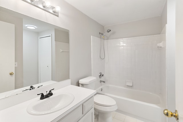 full bath with toilet, tile patterned flooring, vanity, and shower / bath combination