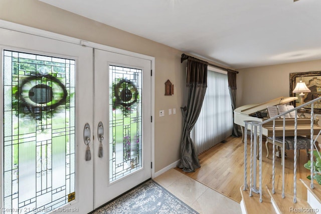 26155 Timber Trl, Dearborn Heights, MI 48127 - foyer with french doors and light tile patterned floors
