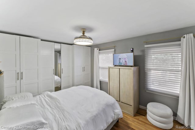 26155 Timber Trl, Dearborn Heights, MI 48127 - bedroom featuring wood finished floors and baseboards