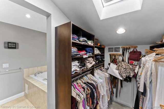 26155 Timber Trl, Dearborn Heights, MI 48127 - spacious closet featuring a skylight and tile patterned flooring