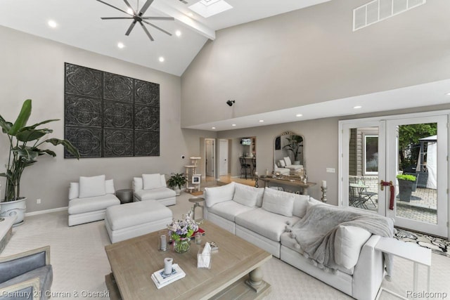 26155 Timber Trl, Dearborn Heights, MI 48127 - carpeted living room featuring recessed lighting, high vaulted ceiling, beam ceiling, a skylight, and baseboards