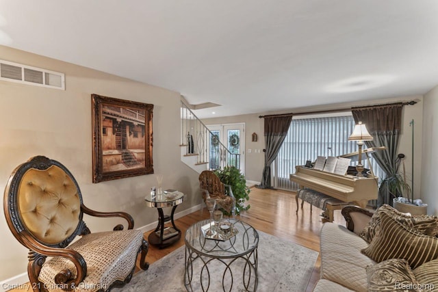 26155 Timber Trl, Dearborn Heights, MI 48127 - living area with baseboards, stairway, and wood finished floors