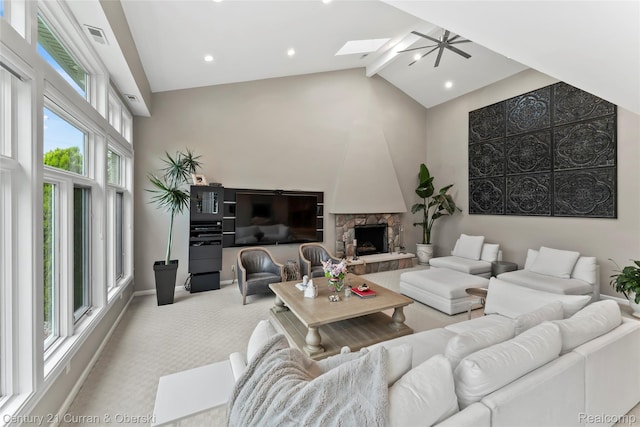 26155 Timber Trl, Dearborn Heights, MI 48127 - living area with high vaulted ceiling, carpet floors, beam ceiling, a skylight, and baseboards