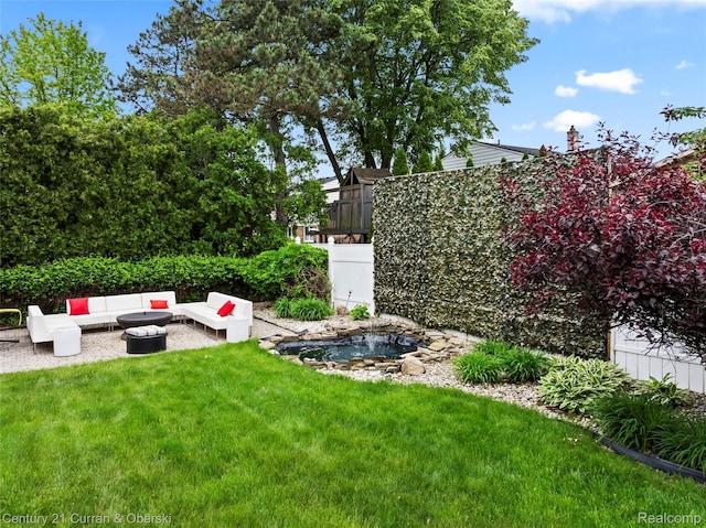26155 Timber Trl, Dearborn Heights, MI 48127 - view of green lawn with outdoor lounge area and a garden pond