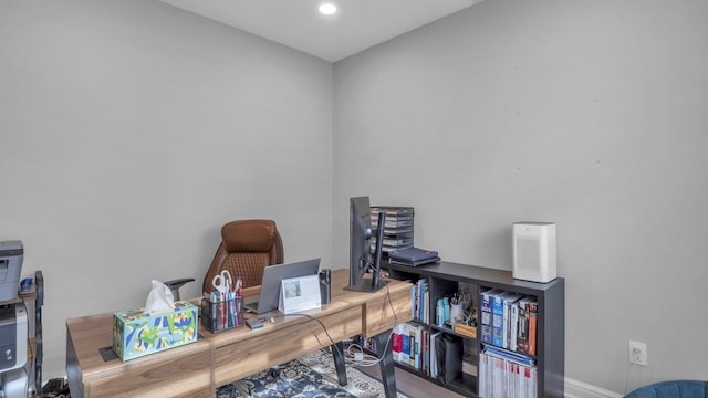 office featuring recessed lighting and baseboards