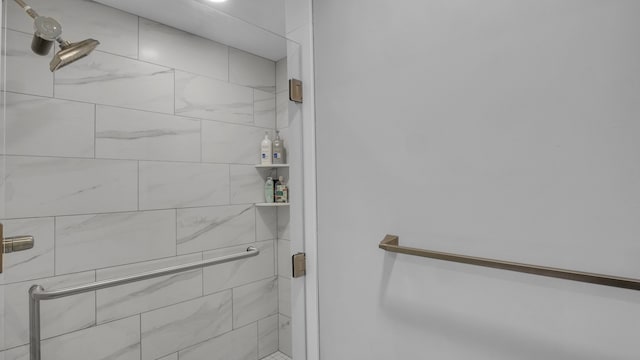 full bath with a shower stall