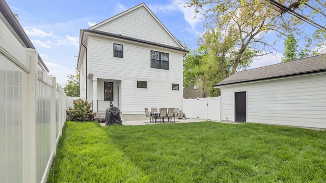 rear view of property with a patio area
