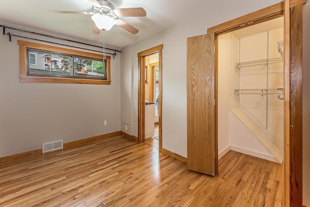 2441 Nottingham Rd, Ann Arbor, MI 48104 - unfurnished bedroom with light wood-style flooring, a closet, and baseboards