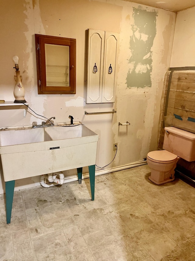 789 7th St, Plainwell, MI 49080 - bathroom featuring toilet and vanity