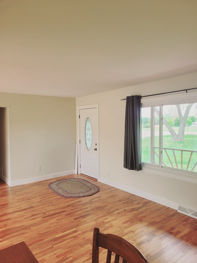 1082 Morris Rd, Lapeer, MI 48446 - entrance foyer with light wood-style floors and baseboards