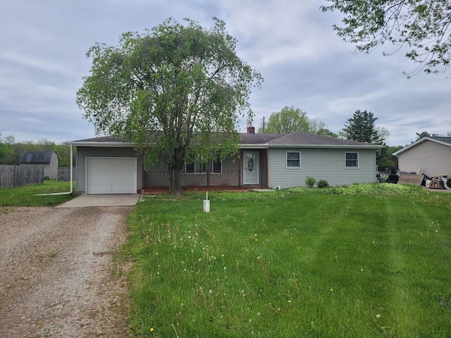 1082 Morris Rd, Lapeer, MI 48446 - ranch-style home featuring driveway, a garage, a front yard, and a chimney