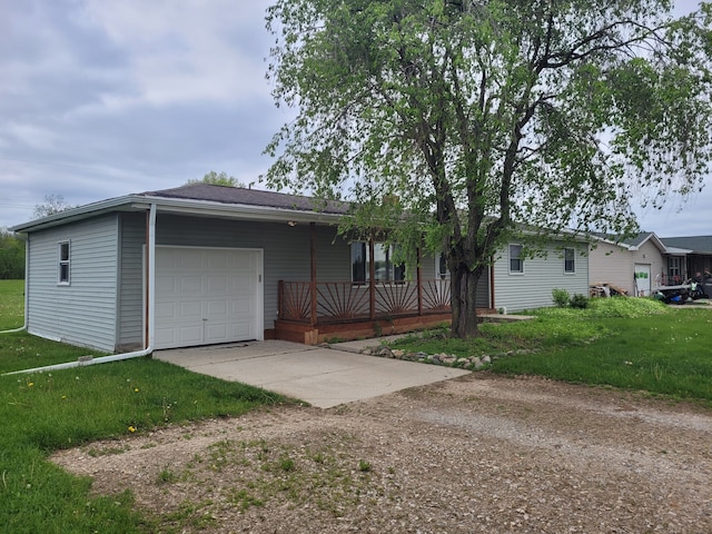 1082 Morris Rd, Lapeer, MI 48446 - ranch-style home with concrete driveway, an attached garage, and a front yard