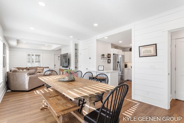 2245 Auburn Ave, Holland, MI 49424 - dining area featuring light wood finished floors, recessed lighting, and wood walls
