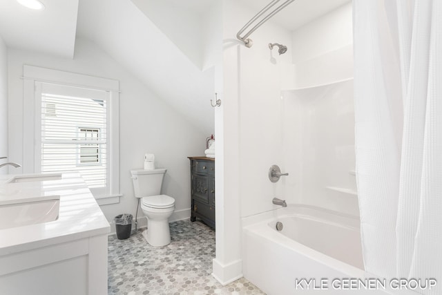 2245 Auburn Ave, Holland, MI 49424 - bathroom featuring toilet, double vanity, shower / bath combination with curtain, vaulted ceiling, and baseboards