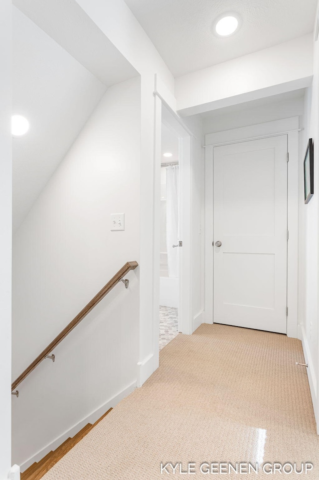 2245 Auburn Ave, Holland, MI 49424 - corridor featuring an upstairs landing, light colored carpet, recessed lighting, and baseboards