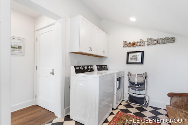 2245 Auburn Ave, Holland, MI 49424 - laundry room with washer and dryer, cabinet space, light flooring, recessed lighting, and baseboards