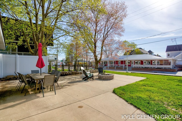 2245 Auburn Ave, Holland, MI 49424 - view of patio / terrace with an outdoor fire pit and outdoor dining area