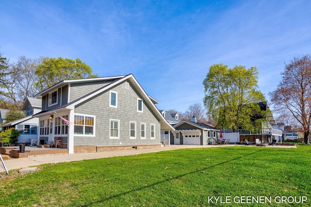 2245 Auburn Ave, Holland, MI 49424 - view of side of home featuring a lawn and a garage