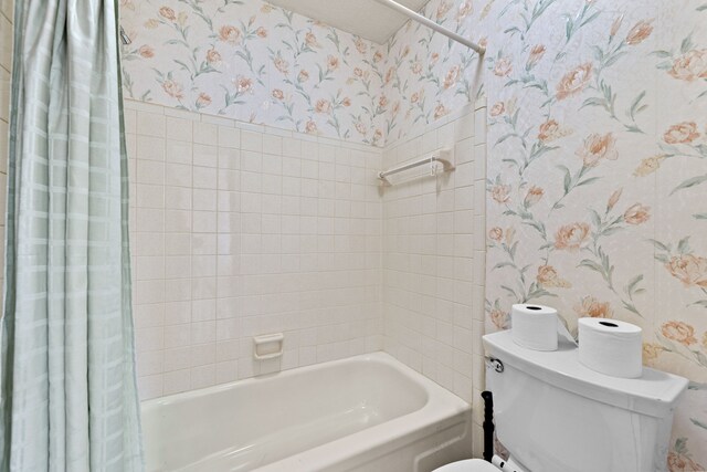 35980 Ann Arbor Trl, Livonia, MI 48150 - bathroom with wallpapered walls, shower / bath combo with shower curtain, and toilet