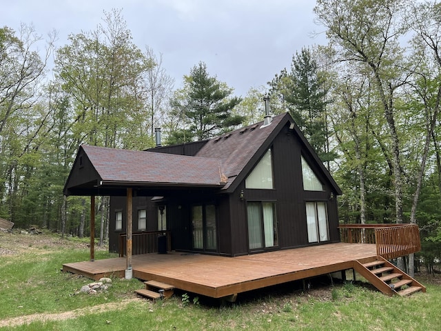 8711 M-37, Irons, MI 49644 - rear view of property with roof with shingles and a deck