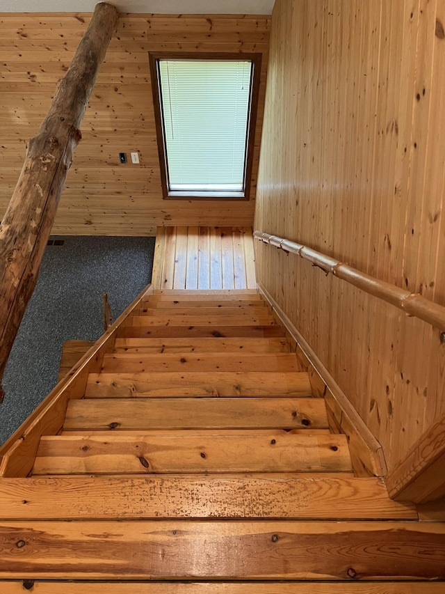 8711 M-37, Irons, MI 49644 - stairway with wooden walls and wood-type flooring