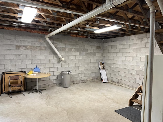 8711 M-37, Irons, MI 49644 - unfinished basement with concrete block wall