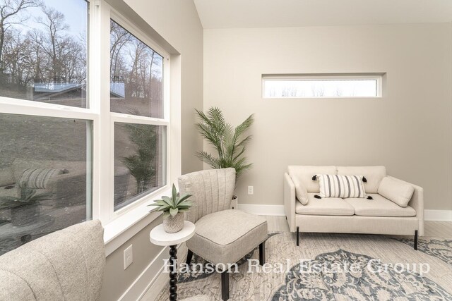 1422 Center Hill Rd SE Unit 46, Lowell, MI 49331 - living area with baseboards and wood finished floors