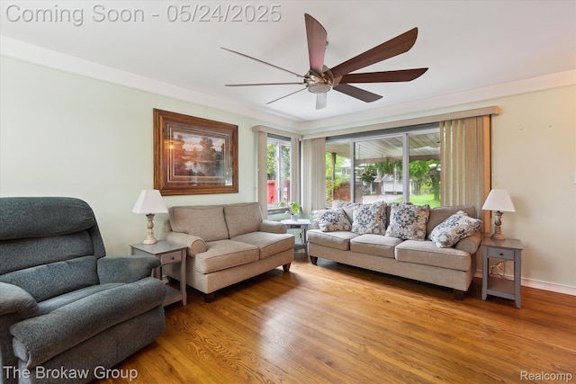 6605 Northview Dr, Clarkston, MI 48346 - living area with a ceiling fan, wood finished floors, and baseboards