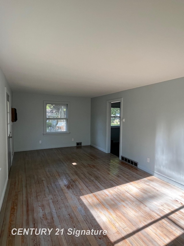 2222 Stone St, Saginaw, MI 48602 - unfurnished room with hardwood / wood-style flooring and baseboards