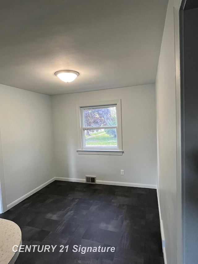 2222 Stone St, Saginaw, MI 48602 - empty room with baseboards