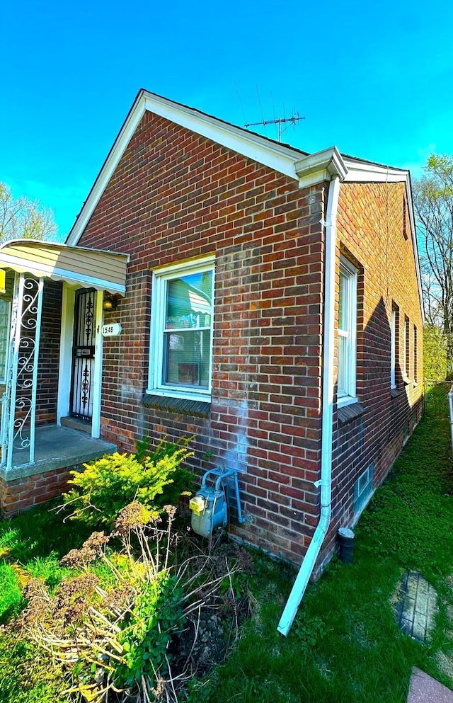 15480 Saratoga St, Detroit, MI 48205 - view of side of property with brick siding