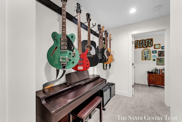 hallway featuring carpet, baseboards, and recessed lighting