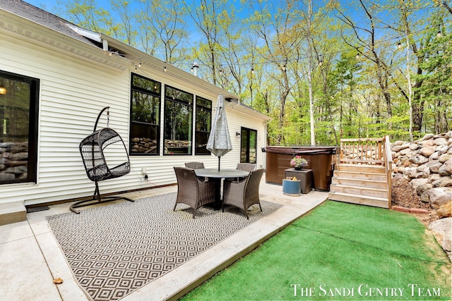 view of patio / terrace featuring a hot tub