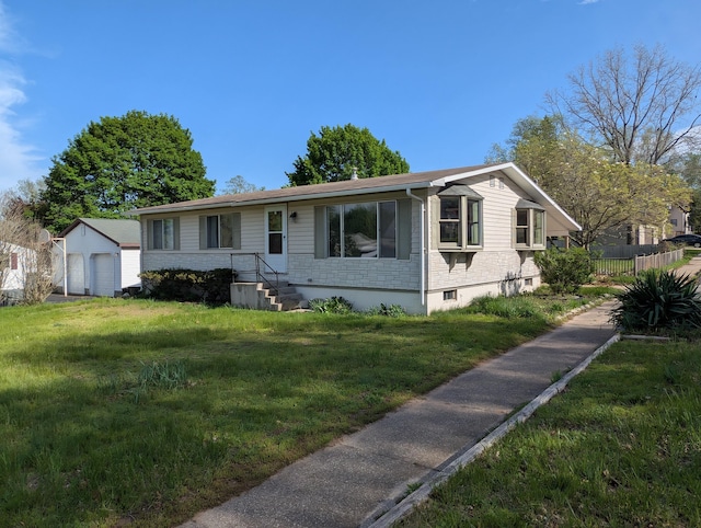 602 Fourth St, Ludington, MI 49431 - ranch-style house featuring an outdoor structure