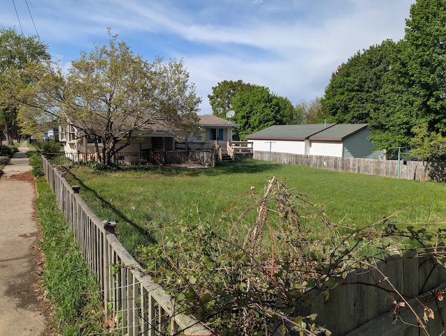 602 Fourth St, Ludington, MI 49431 - view of yard with a deck