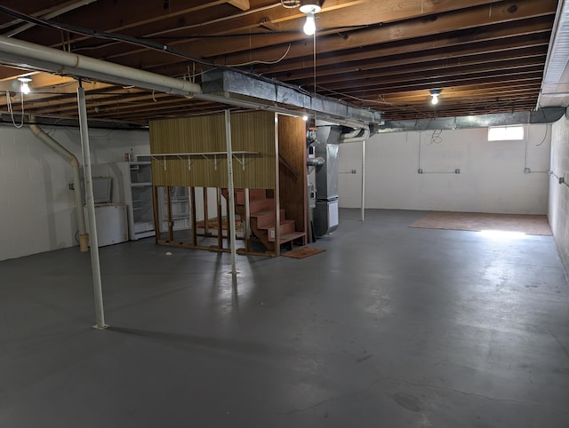 602 Fourth St, Ludington, MI 49431 - basement featuring stairway and heating unit