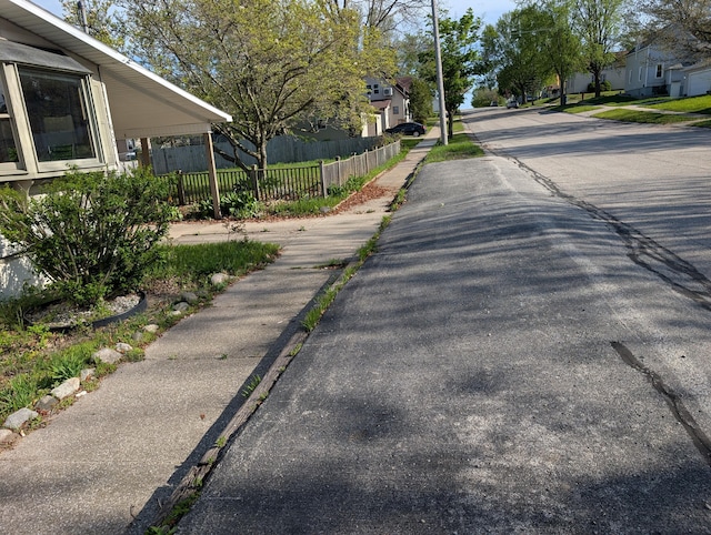 602 Fourth St, Ludington, MI 49431 - view of asphalt street with sidewalks and a residential view