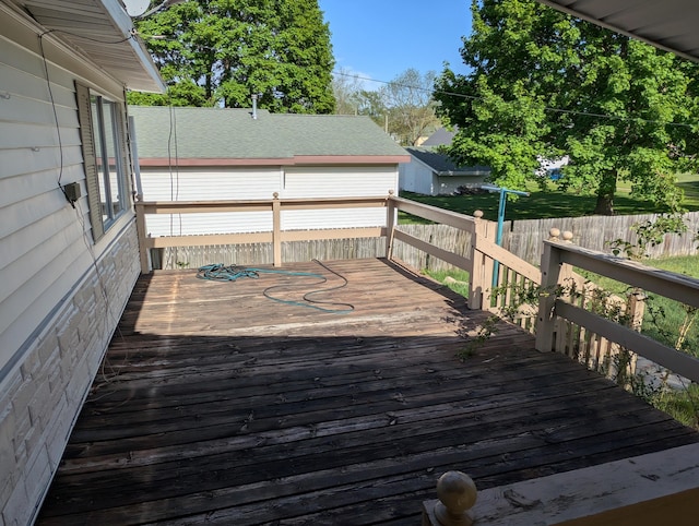 602 Fourth St, Ludington, MI 49431 - wooden terrace with fence