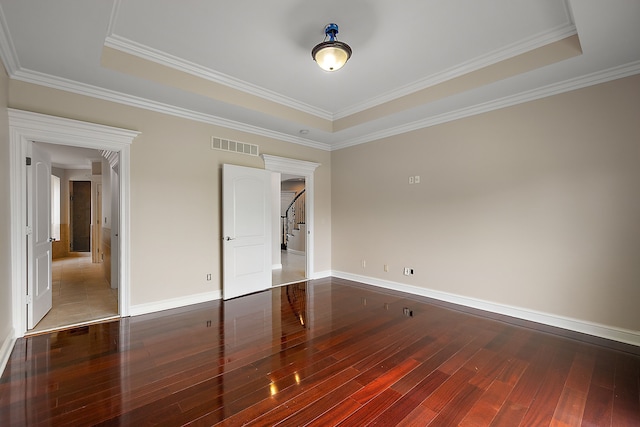 66701 Notre Dame Blvd, Washington, MI 48095 - unfurnished bedroom with hardwood / wood-style floors, a tray ceiling, and ornamental molding