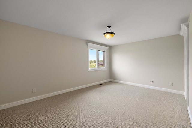 66701 Notre Dame Blvd, Washington, MI 48095 - unfurnished room featuring light colored carpet and baseboards