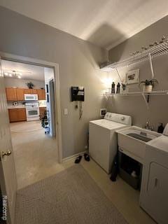 4412 Aster Blvd, Howell, MI 48843 - laundry room with washing machine and dryer