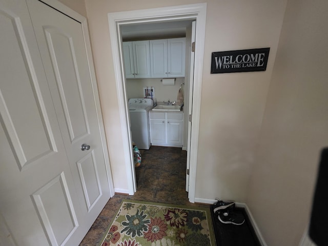 5022 N Ford Lake Rd, Fountain, MI 49410 - washroom featuring cabinet space, washer / clothes dryer, and baseboards