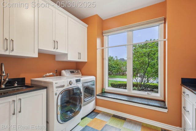 966 Mcdonald Dr, Northville, MI 48167 - laundry room featuring cabinet space, independent washer and dryer, and wood finished floors